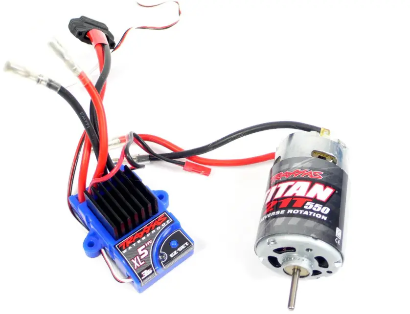 Brushed motor and electronic speed controller components used in an RC crawler