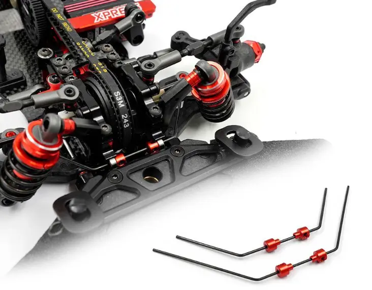Close-up of the sway bars and suspension components on an RC touring car chassis