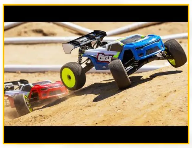 RC off-road truck landing with its chassis close to the ground after a jump