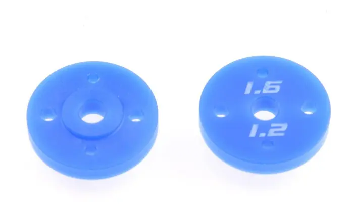 RC shock pistons with different oil-flow hole patterns