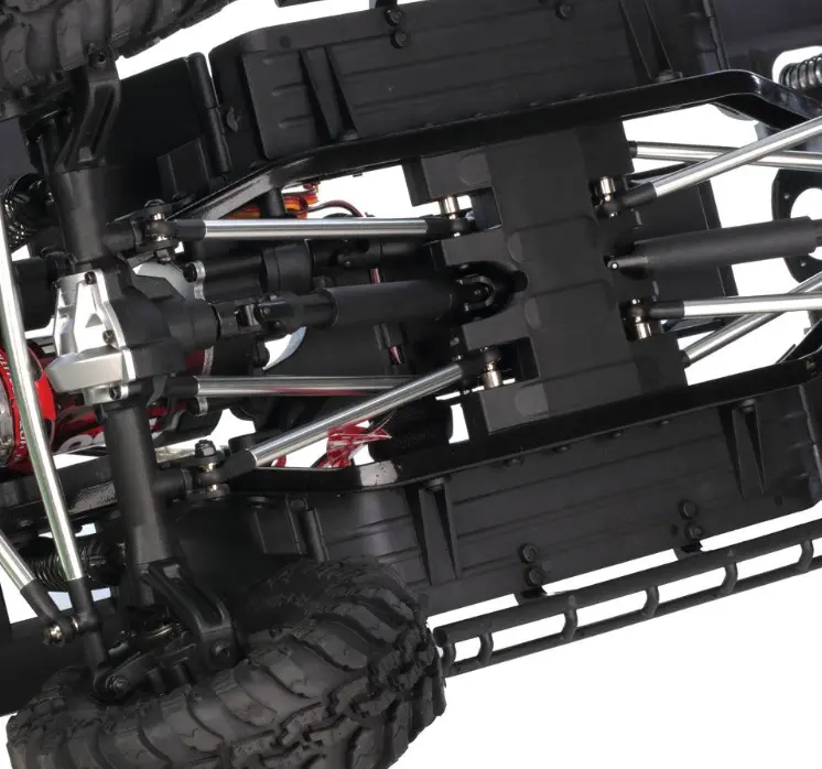 Underside of an RC rock crawler showing the skid plate, drivetrain and portal axles