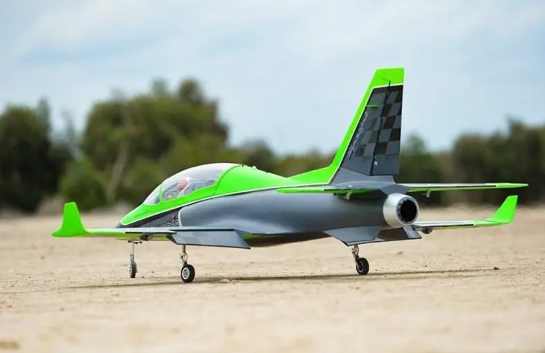 RC jet aircraft with a micro turbine engine mounted in the fuselage